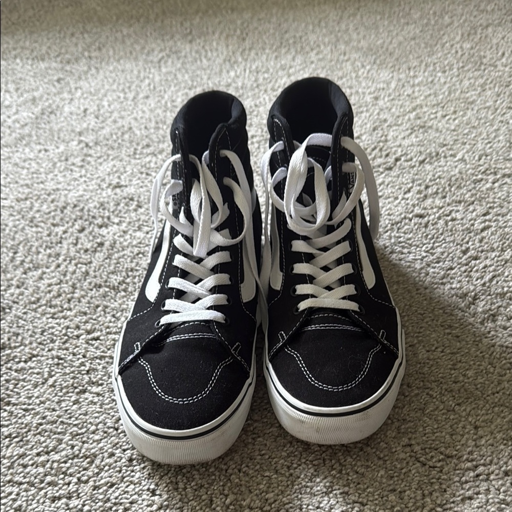 Vans Black and White High-Top Sneakers